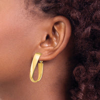14k High Polished 7mm Wavy Oval Omega Back Hoop Earrings-PRE992