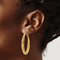 14k Polished and Textured Twisted Fancy Oval Hoop Earrings-TF1351