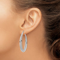 14k White Gold Polished and Textured Twisted Fancy Oval Hoop Earrings-TF1351W