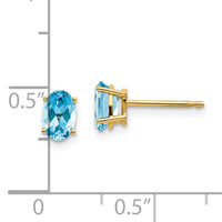 14k 6x4 Oval December/Blue Topaz Post Earrings-XBE24